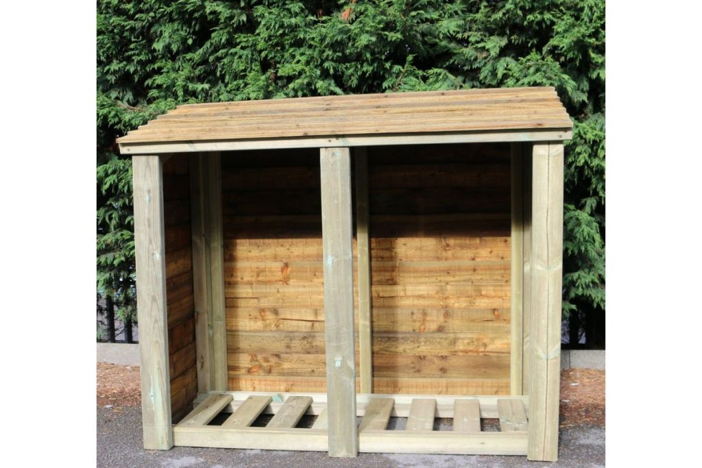 Wood log store at Hilltop Garden Centre Essex
